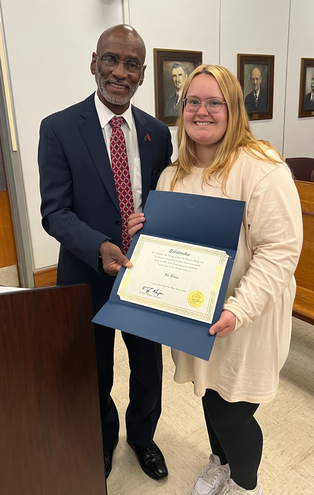 Anderson County Commissioner Anthony Allen presented a $500 scholarship to Class of 2025 Oak Ridge High School graduate Zoe Brown at the May 19th meeting of the Anderson County Board of Commissioners.